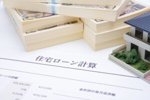 家の模型と住宅ローン計算